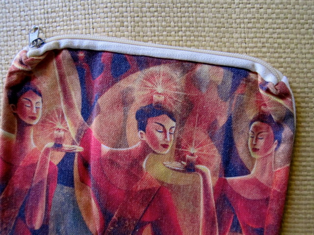Festive and feminine artwork make this pouch one of a kind.