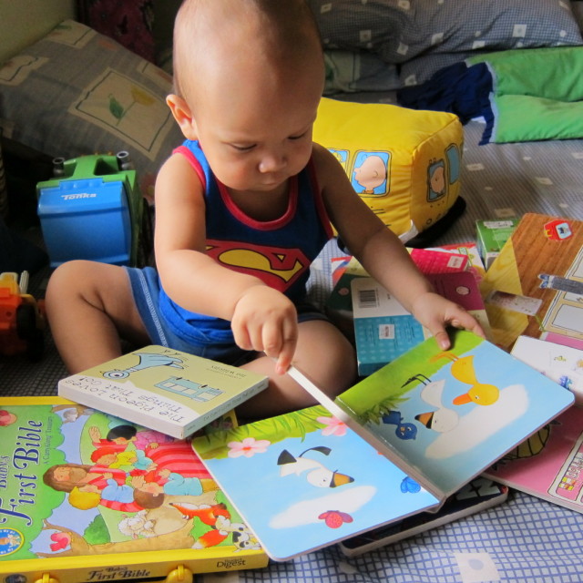 My one-year-old bookworm. One of my favorite pictures of my son.